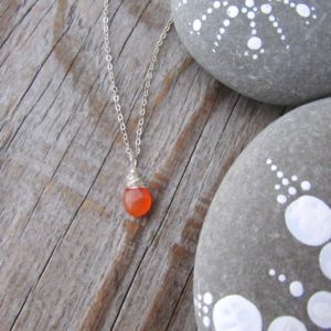 Shop Carnelian Pendants! Carnelian Necklace, orange gemstone, wire wrapped, small, solitaire pendant | Natural genuine Carnelian pendants. Buy crystal jewelry, handmade handcrafted artisan jewelry for women.  Unique handmade gift ideas. #jewelry #beadedpendants #beadedjewelry #gift #shopping #handmadejewelry #fashion #style #product #pendants #affiliate #ad