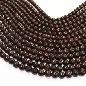 Shop Garnet Round Beads! 6mm Garnet Beads, Round Gemstone Beads, Wholesale Beads | Natural genuine round Garnet beads for beading and jewelry making.  #jewelry #beads #beadedjewelry #diyjewelry #jewelrymaking #beadstore #beading #affiliate #ad