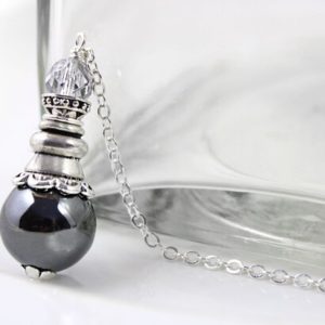 Shop Hematite Necklaces! Hematite Dowsing Pendulum,  Metaphysical Tool, Intuition, Divination, Magic, Wicca, Yoga Gift, Scrying Pendulum, Hematite Pendulum Necklace | Natural genuine Hematite necklaces. Buy crystal jewelry, handmade handcrafted artisan jewelry for women.  Unique handmade gift ideas. #jewelry #beadednecklaces #beadedjewelry #gift #shopping #handmadejewelry #fashion #style #product #necklaces #affiliate #ad