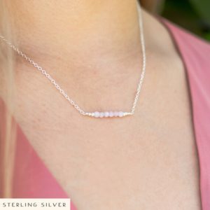 Shop Kunzite Necklaces! Kunzite semi-precious gemstone beaded bar necklace – Tiny sparkling real mineral bead jewellery – Pink/purple natural crystal gift for women | Natural genuine Kunzite necklaces. Buy crystal jewelry, handmade handcrafted artisan jewelry for women.  Unique handmade gift ideas. #jewelry #beadednecklaces #beadedjewelry #gift #shopping #handmadejewelry #fashion #style #product #necklaces #affiliate #ad