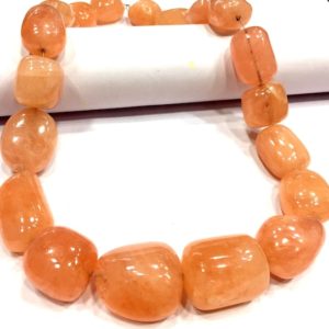 Shop Morganite Chip & Nugget Beads! Extremely Rare~Natural Pink Morganite Smooth Nuggets Beads Extra Large Size Nuggets High Luster Morganite Beads Peachy Orange Pink Color. | Natural genuine chip Morganite beads for beading and jewelry making.  #jewelry #beads #beadedjewelry #diyjewelry #jewelrymaking #beadstore #beading #affiliate #ad