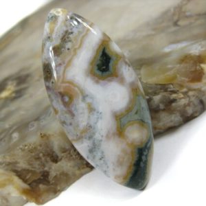 Shop Ocean Jasper Cabochons! ON SALE: Ocean Jasper (Orbicular Jasper) Cabochon | Natural genuine stones & crystals in various shapes & sizes. Buy raw cut, tumbled, or polished gemstones for making jewelry or crystal healing energy vibration raising reiki stones. #crystals #gemstones #crystalhealing #crystalsandgemstones #energyhealing #affiliate #ad
