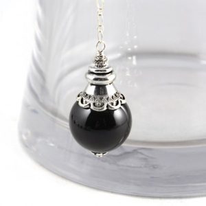 Shop Onyx Jewelry! Crystal Pendulum, Black Onyx Pendulum, Crystal Necklace, Gemstone Pendulum, Divination, Crystal Pendulum Necklace, Wicca, Dowsing Pendulum | Natural genuine Onyx jewelry. Buy crystal jewelry, handmade handcrafted artisan jewelry for women.  Unique handmade gift ideas. #jewelry #beadedjewelry #beadedjewelry #gift #shopping #handmadejewelry #fashion #style #product #jewelry #affiliate #ad