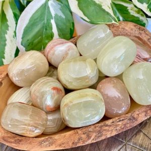 Shop Tumbled Onyx Crystals & Pocket Stones! Rainbow Onyx Tumbled Stone | Green Banded Crystal | Marble Onyx | Natural Gemstone | Natural genuine stones & crystals in various shapes & sizes. Buy raw cut, tumbled, or polished gemstones for making jewelry or crystal healing energy vibration raising reiki stones. #crystals #gemstones #crystalhealing #crystalsandgemstones #energyhealing #affiliate #ad