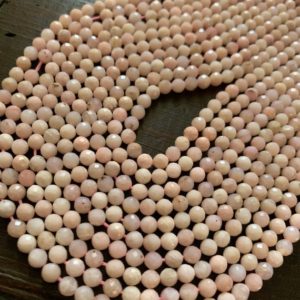 Shop Opal Round Beads! 1/2 strand of pink opal round beads | Natural genuine round Opal beads for beading and jewelry making.  #jewelry #beads #beadedjewelry #diyjewelry #jewelrymaking #beadstore #beading #affiliate #ad