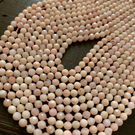 1/2 Strand Of Pink Opal Round Beads