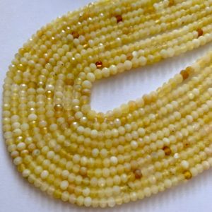 Shop Opal Round Beads! 1/2 strand of yellow opal round beads | Natural genuine round Opal beads for beading and jewelry making.  #jewelry #beads #beadedjewelry #diyjewelry #jewelrymaking #beadstore #beading #affiliate #ad