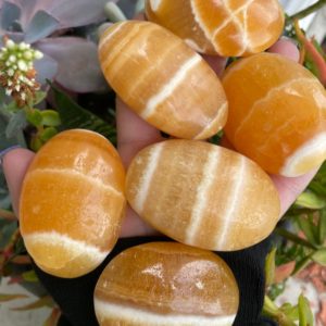 Shop Orange Calcite Shapes! Orange Calcite, Orange Calcite Palm Stone, Qty. 1 | Natural genuine stones & crystals in various shapes & sizes. Buy raw cut, tumbled, or polished gemstones for making jewelry or crystal healing energy vibration raising reiki stones. #crystals #gemstones #crystalhealing #crystalsandgemstones #energyhealing #affiliate #ad