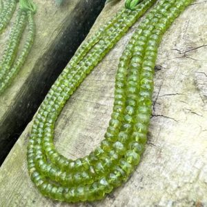 Shop Peridot Faceted Beads! Natural green  Handcut Rustic Peridot Green faceted  Rondelle spacer  Beads / Natural Peridot Gemstone Beads/ 5mm approx | Natural genuine faceted Peridot beads for beading and jewelry making.  #jewelry #beads #beadedjewelry #diyjewelry #jewelrymaking #beadstore #beading #affiliate #ad