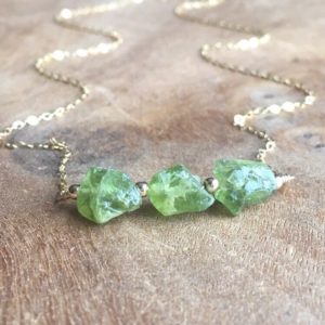 Raw Peridot Necklace, Peridot Pendant,  August Birthstone Jewelry,  Raw Crystal Necklace, Gemstone Necklace, Gift For Women | Natural genuine Gemstone pendants. Buy crystal jewelry, handmade handcrafted artisan jewelry for women.  Unique handmade gift ideas. #jewelry #beadedpendants #beadedjewelry #gift #shopping #handmadejewelry #fashion #style #product #pendants #affiliate #ad