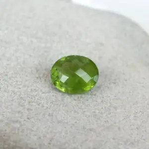 Shop Peridot Stones & Crystals! Natural Peridot Loose Gemstone from Pakistan, Oval Checkerboard Cut, 4.17ct, 9x11mm | Natural genuine stones & crystals in various shapes & sizes. Buy raw cut, tumbled, or polished gemstones for making jewelry or crystal healing energy vibration raising reiki stones. #crystals #gemstones #crystalhealing #crystalsandgemstones #energyhealing #affiliate #ad