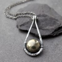 Pyrite Teardrop Pendant Necklace, Sterling Silver Hammered Teardrop Pendant, Iron Pyrite Gemstone For Protection, Fool's Gold Necklace | Natural genuine Gemstone jewelry. Buy crystal jewelry, handmade handcrafted artisan jewelry for women.  Unique handmade gift ideas. #jewelry #beadedjewelry #beadedjewelry #gift #shopping #handmadejewelry #fashion #style #product #jewelry #affiliate #ad