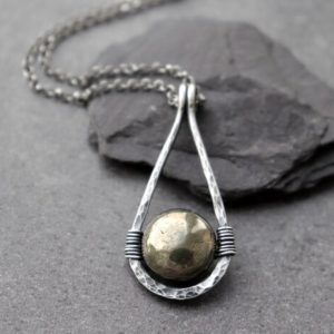 Pyrite Teardrop Pendant Necklace, Sterling Silver Hammered Teardrop Pendant, Iron Pyrite Gemstone for Protection, Fool's Gold Necklace | Natural genuine Pyrite pendants. Buy crystal jewelry, handmade handcrafted artisan jewelry for women.  Unique handmade gift ideas. #jewelry #beadedpendants #beadedjewelry #gift #shopping #handmadejewelry #fashion #style #product #pendants #affiliate #ad