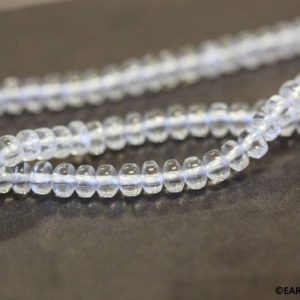 Shop Quartz Crystal Rondelle Beads! S/ Rock Crystal 4mm Rondelle beads 16" strand Natural clear quartz gemstone beads For jewelry making | Natural genuine rondelle Quartz beads for beading and jewelry making.  #jewelry #beads #beadedjewelry #diyjewelry #jewelrymaking #beadstore #beading #affiliate #ad