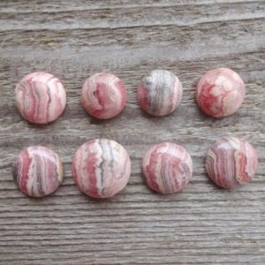Shop Rhodochrosite Cabochons! Pink Rhodochrosite round cabochon, Natural gem cabochon for ring | Natural genuine stones & crystals in various shapes & sizes. Buy raw cut, tumbled, or polished gemstones for making jewelry or crystal healing energy vibration raising reiki stones. #crystals #gemstones #crystalhealing #crystalsandgemstones #energyhealing #affiliate #ad