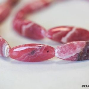 Shop Rhodochrosite Beads! M/ Rhodochrosite 13x30mm Smooth Flat Oval Loose Beads 15.5" strand Natural Bright Pink Argentina Rhodochrosite beads for jewelry making | Natural genuine beads Rhodochrosite beads for beading and jewelry making.  #jewelry #beads #beadedjewelry #diyjewelry #jewelrymaking #beadstore #beading #affiliate #ad