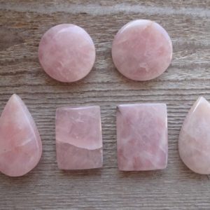 Shop Rose Quartz Cabochons! Pink Rose Quartz cabochon for jewelry making | Natural genuine stones & crystals in various shapes & sizes. Buy raw cut, tumbled, or polished gemstones for making jewelry or crystal healing energy vibration raising reiki stones. #crystals #gemstones #crystalhealing #crystalsandgemstones #energyhealing #affiliate #ad