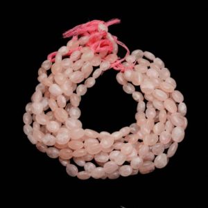 Shop Rose Quartz Chip & Nugget Beads! AAA Rose Quartz Nuggets 10x13mm to 12x15mm Beads | 13inch Strand | Natural Soft Pink Quartz Semi Precious Gemstone Oval Tumbled Smooth Beads | Natural genuine chip Rose Quartz beads for beading and jewelry making.  #jewelry #beads #beadedjewelry #diyjewelry #jewelrymaking #beadstore #beading #affiliate #ad