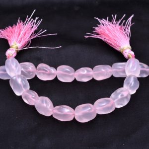Shop Rose Quartz Chip & Nugget Beads! AAA+ Rose Quartz Rare Gemstone Carving 10mm-12mm Nugget Beads | Natural Pink Rose Quartz Gemstone Oval Tumbled Smooth Beads | 5inch Strand | Natural genuine chip Rose Quartz beads for beading and jewelry making.  #jewelry #beads #beadedjewelry #diyjewelry #jewelrymaking #beadstore #beading #affiliate #ad