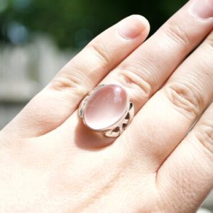 Shop Rose Quartz Rings! Celtic Rose Quartz Trinity Knot Ring // Rose Quartz Jewelry // Sterling Silver // Village Silversmith | Natural genuine Rose Quartz rings, simple unique handcrafted gemstone rings. #rings #jewelry #shopping #gift #handmade #fashion #style #affiliate #ad