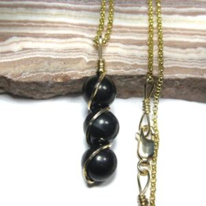 Shop Shungite Pendants! Shungite Pendant in 14k Gold Filled Wire w/FREE 18" 14k Gold Filled Chain | Natural genuine Shungite pendants. Buy crystal jewelry, handmade handcrafted artisan jewelry for women.  Unique handmade gift ideas. #jewelry #beadedpendants #beadedjewelry #gift #shopping #handmadejewelry #fashion #style #product #pendants #affiliate #ad