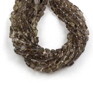 Shop Smoky Quartz Chip & Nugget Beads! 1 Strand Natural Smoky Quartz Nuggets Faceted Size 7-10 Approx 14 Inch Long,Smoky Quartz,Nugget,Faceted Beads,Smoky Beads,Nuggets Smoky Bead | Natural genuine chip Smoky Quartz beads for beading and jewelry making.  #jewelry #beads #beadedjewelry #diyjewelry #jewelrymaking #beadstore #beading #affiliate #ad