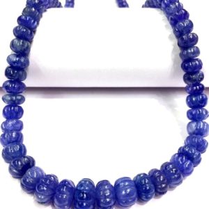Shop Tanzanite Rondelle Beads! AAA QUALITY~~Natural Tanzanite Melon Beads Tanzanite Rondelle Carved Beads Genuine Tanzanite Gemstone Beads Tanzanite Strand Beads Wholesale | Natural genuine rondelle Tanzanite beads for beading and jewelry making.  #jewelry #beads #beadedjewelry #diyjewelry #jewelrymaking #beadstore #beading #affiliate #ad