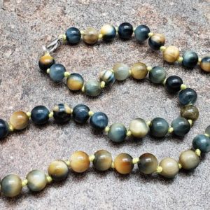 Shop Tiger Eye Jewelry! Dream Tiger Eye Hand Knotted Necklace with Lobster Claw Clasp | Natural genuine Tiger Eye jewelry. Buy crystal jewelry, handmade handcrafted artisan jewelry for women.  Unique handmade gift ideas. #jewelry #beadedjewelry #beadedjewelry #gift #shopping #handmadejewelry #fashion #style #product #jewelry #affiliate #ad