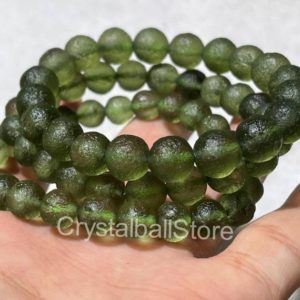 100% Natural Certified Moldavite Bracelet / Genuine Moldavite / Raw Moldavite Beads / Authentic Moldavite/ Moldavite From Czech Republic | Natural genuine Moldavite bracelets. Buy crystal jewelry, handmade handcrafted artisan jewelry for women.  Unique handmade gift ideas. #jewelry #beadedbracelets #beadedjewelry #gift #shopping #handmadejewelry #fashion #style #product #bracelets #affiliate #ad