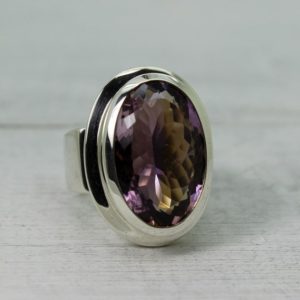 Shop Ametrine Rings! Magnifique Ametrine ring … Amethyst and Citrine stone called Ametrine oval shape cut stone with a flat top set on 925 sterling silver | Natural genuine Ametrine rings, simple unique handcrafted gemstone rings. #rings #jewelry #shopping #gift #handmade #fashion #style #affiliate #ad