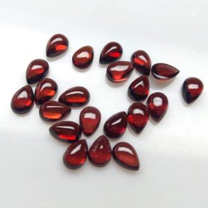 Shop Garnet Cabochons! 10 piece 3x4mm To 6x8mm Red Garnet Cabochon Pear Gemstone, Red Garnet Pear Cabochon Loose Gemstone, Red garnet Cabochon Loose Gemstone | Natural genuine stones & crystals in various shapes & sizes. Buy raw cut, tumbled, or polished gemstones for making jewelry or crystal healing energy vibration raising reiki stones. #crystals #gemstones #crystalhealing #crystalsandgemstones #energyhealing #affiliate #ad