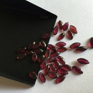 Shop Garnet Cabochons! 20 Pieces 8x4mm Each Garnet Marquise Shaped Wine Red Loose Cabochons G8 | Natural genuine stones & crystals in various shapes & sizes. Buy raw cut, tumbled, or polished gemstones for making jewelry or crystal healing energy vibration raising reiki stones. #crystals #gemstones #crystalhealing #crystalsandgemstones #energyhealing #affiliate #ad