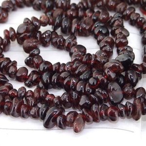 Shop Garnet Chip & Nugget Beads! strand Nugget Chip Wine Garnet Gemstone Beads —– 5mmx 6mm —– about 180Pieces —– gemstone beads— 34" in length | Natural genuine chip Garnet beads for beading and jewelry making.  #jewelry #beads #beadedjewelry #diyjewelry #jewelrymaking #beadstore #beading #affiliate #ad