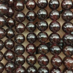 Shop Garnet Round Beads! Wholesale Garnet Stone Beads, Natural Gemstone Beads, Smooth Round Beads, 4mm 6mm 8mm 10mm 12mm 15'' | Natural genuine round Garnet beads for beading and jewelry making.  #jewelry #beads #beadedjewelry #diyjewelry #jewelrymaking #beadstore #beading #affiliate #ad
