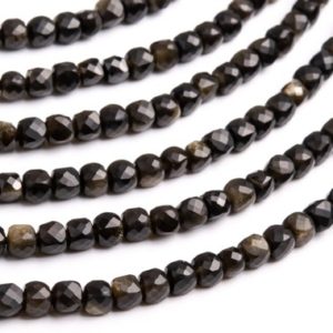 Shop Golden Obsidian Beads! Genuine Natural Golden Obsidian Gemstone Beads 4-5MM Black Faceted Cube AAA Quality Loose Beads (111653) | Natural genuine faceted Golden Obsidian beads for beading and jewelry making.  #jewelry #beads #beadedjewelry #diyjewelry #jewelrymaking #beadstore #beading #affiliate #ad