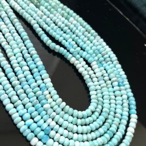 Shop Larimar Rondelle Beads! Half strand of Larimar smooth rondelles | Natural genuine rondelle Larimar beads for beading and jewelry making.  #jewelry #beads #beadedjewelry #diyjewelry #jewelrymaking #beadstore #beading #affiliate #ad