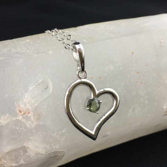 Heart Signature! A 5mm Faceted Genuine Moldavite Held Within A Sterling Silver Rhodium Plated Heart