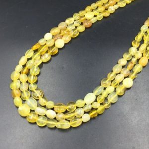 Shop Opal Chip & Nugget Beads! Yellow Opal Pebble Beads Polished Yellow Opal Nugget Beads 6-8mm Yellow Opal Beads Gemstone Crystal Beads 15.5" Strand | Natural genuine chip Opal beads for beading and jewelry making.  #jewelry #beads #beadedjewelry #diyjewelry #jewelrymaking #beadstore #beading #affiliate #ad