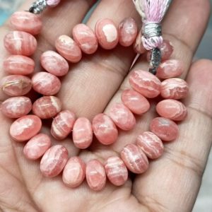 Shop Rhodochrosite Rondelle Beads! 7 Inch Strand,  Natural Rhodochrosite Smooth Rondelles, Size. 9-8mm | Natural genuine rondelle Rhodochrosite beads for beading and jewelry making.  #jewelry #beads #beadedjewelry #diyjewelry #jewelrymaking #beadstore #beading #affiliate #ad