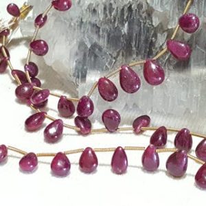 Shop Ruby Bead Shapes! Natural Ruby Graduating Smooth Flat Drop Beads 10 In. Full Strand, Quality, Natural Ruby, Corundum Beads, Smooth Briolette Drop Beads | Natural genuine other-shape Ruby beads for beading and jewelry making.  #jewelry #beads #beadedjewelry #diyjewelry #jewelrymaking #beadstore #beading #affiliate #ad