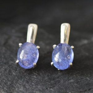 Shop Tanzanite Earrings! Tanzanite Earrings, Natural Tanzanite, Tanzanite Studs, December Birthstone, Stud Earrings, Simple Blue Earrings, Oval Studs, Solid Silver | Natural genuine Tanzanite earrings. Buy crystal jewelry, handmade handcrafted artisan jewelry for women.  Unique handmade gift ideas. #jewelry #beadedearrings #beadedjewelry #gift #shopping #handmadejewelry #fashion #style #product #earrings #affiliate #ad