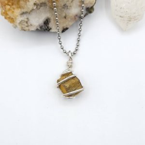 Shop Tiger Eye Pendants! Tiger's Eye Necklace, Silver Wire Wrapped Tiger's Eye Pendant, Raw Tiger's Eye Jewelry, Money Attracting Necklace, Protection Necklace | Natural genuine Tiger Eye pendants. Buy crystal jewelry, handmade handcrafted artisan jewelry for women.  Unique handmade gift ideas. #jewelry #beadedpendants #beadedjewelry #gift #shopping #handmadejewelry #fashion #style #product #pendants #affiliate #ad