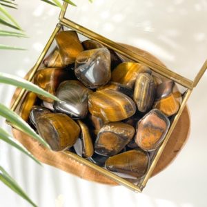 Shop Tumbled Tiger Eye Crystals & Pocket Stones! Tiger Eye Tumbled Crystals | Yellow Tiger Eye | Natural genuine stones & crystals in various shapes & sizes. Buy raw cut, tumbled, or polished gemstones for making jewelry or crystal healing energy vibration raising reiki stones. #crystals #gemstones #crystalhealing #crystalsandgemstones #energyhealing #affiliate #ad
