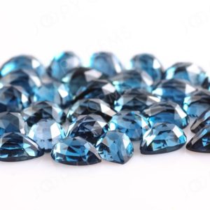 Shop Topaz Cabochons! London Blue Topaz Rose Cut Pear Cabochon 7x5mm – per stone | Natural genuine stones & crystals in various shapes & sizes. Buy raw cut, tumbled, or polished gemstones for making jewelry or crystal healing energy vibration raising reiki stones. #crystals #gemstones #crystalhealing #crystalsandgemstones #energyhealing #affiliate #ad