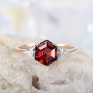 Vintage Hexagon Cut Garnet Engagement Ring, Three Stone Wedding Ring, Rose Gold January Birthstone Trilliant Cut Moissanite Promise Ring | Natural genuine Array rings, simple unique alternative gemstone engagement rings. #rings #jewelry #bridal #wedding #jewelryaccessories #engagementrings #weddingideas #affiliate #ad