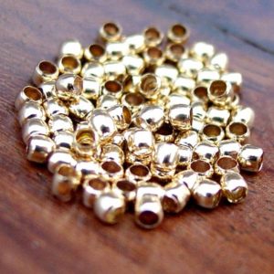 Shop Crimp Beads! 2 mm Crimp Beads,  Gold Plated Brass 1.5 mm Inner Diameter (100 or 500 or 1000 pcs) | Shop jewelry making and beading supplies, tools & findings for DIY jewelry making and crafts. #jewelrymaking #diyjewelry #jewelrycrafts #jewelrysupplies #beading #affiliate #ad