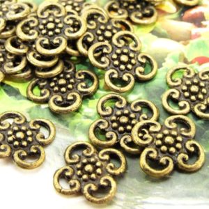 Shop Jewelry Connectors! 4 loops Flower Antique Bronze Connector Link Filigree Metal 12mm— 15Beads—- 35B | Shop jewelry making and beading supplies, tools & findings for DIY jewelry making and crafts. #jewelrymaking #diyjewelry #jewelrycrafts #jewelrysupplies #beading #affiliate #ad