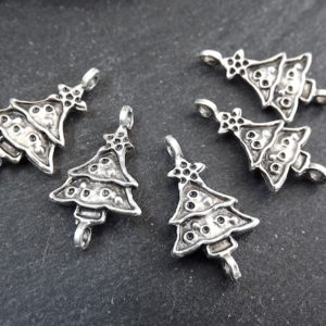 Shop Jewelry Connectors! Christmas Tree Charms, Small Christmas Tree Holiday Pendant Connectors, Non Tarnish, Matte Antique Silver Plated, 6pc | Shop jewelry making and beading supplies, tools & findings for DIY jewelry making and crafts. #jewelrymaking #diyjewelry #jewelrycrafts #jewelrysupplies #beading #affiliate #ad