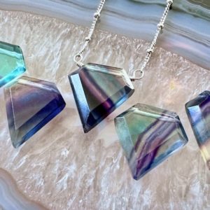 Shop Fluorite Necklaces! Striped fluorite necklace for women Rainbow fluorite pendulum Crystal shield necklace Raw flurite necklace Rainbow fluorite pendant | Natural genuine Fluorite necklaces. Buy crystal jewelry, handmade handcrafted artisan jewelry for women.  Unique handmade gift ideas. #jewelry #beadednecklaces #beadedjewelry #gift #shopping #handmadejewelry #fashion #style #product #necklaces #affiliate #ad