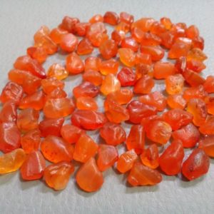 Shop Raw & Rough Carnelian Stones! 10 Pieces Raw Carnelian Stone 12-15 MM Raw, Fabulous Gemstone Rough Natural Carnelian Gemstone, Healing Crystal Orange Carnelian Raw Stone | Natural genuine stones & crystals in various shapes & sizes. Buy raw cut, tumbled, or polished gemstones for making jewelry or crystal healing energy vibration raising reiki stones. #crystals #gemstones #crystalhealing #crystalsandgemstones #energyhealing #affiliate #ad